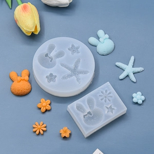 Silicone DIY molds for starfish, flowers, and rabbits with colorful finished crafts