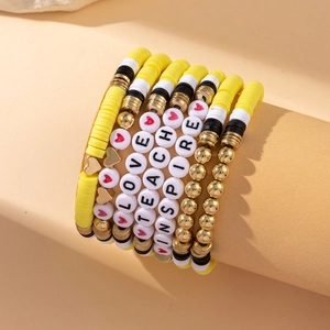 Detail of multi-layer beaded bracelet set with clay beads and teacher inspiration charms