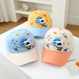 Kids baseball caps with astronaut bear and space prints in colorful patchwork designs