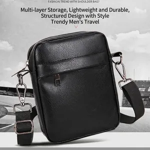 Men's black crossbody phone bag in textured PU leather with adjustable nylon strap