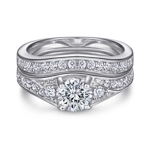 Macro shot of 925 silver moissanite ring set with classic four-prong setting detail