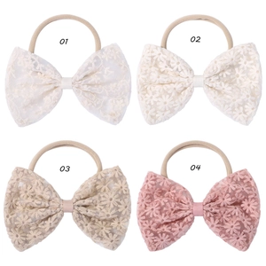 Set of four lace floral bow baby headbands in white, beige and pink elastic nylon