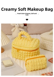 Macro detail of cream puff textured makeup bag set on a cozy bedroom vanity