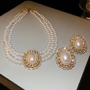 Vintage French 3-layer pearl necklace and earring set with gold rhinestone accents