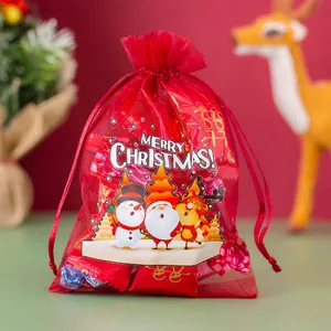 Christmas organza drawstring gift bag with Santa Claus print and colorful candies