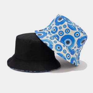 Cappello a secchiello reversibile con lato nero e stampa con motivo occhio blu