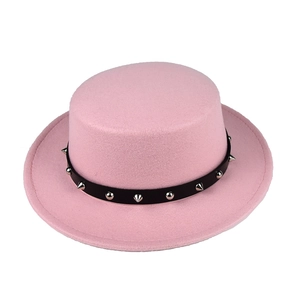 Pink wool felt flat top boater hat featuring a black leather band with silver punk studs