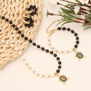 Golden turtle pendant jewelry set with black agate, pearls, necklace, bracelet and earrings