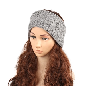 Close-up of grey cable knit texture on winter ear warmer headband for women