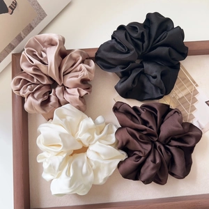 Set of 4 elegant satin scrunchies in champagne, black, white, and coffee earth tones