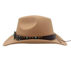 Detail of western felt hat featuring turquoise beads and studs on a brown leather band