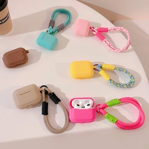 Colorful silicone AirPods cases with braided lanyards in six vibrant dopamine shades