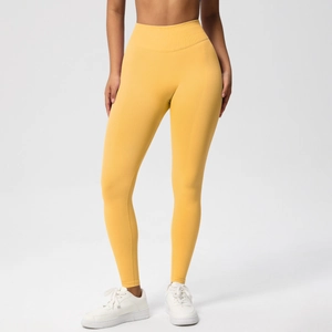Close-up of seamless ginger high-waisted yoga pants with tummy control compression band