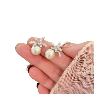 Silver needle flower pearl earrings with sparkling zircon butterfly design for women