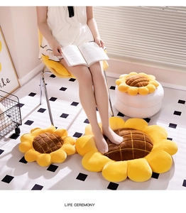 Three sizes of sunflower plush cushions with yellow petals and soft velvet texture