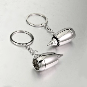 Polished silver aircraft engine keychain set with realistic jet turbine fan details