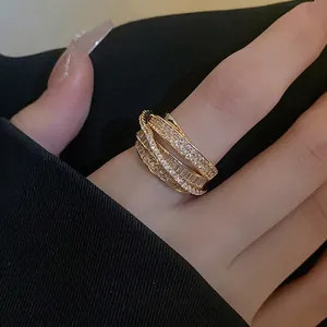 Elegant multi-layer gold ring with zircon accents, sparkling luxury design for women