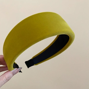 Close-up of ginger yellow velvet padded headband with soft texture and non-slip lining
