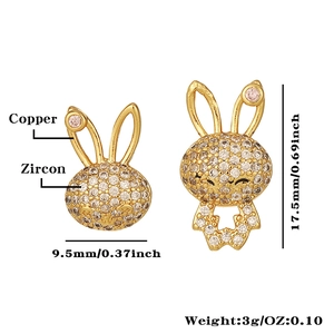 Detail of copper rabbit earring with zircons, pearls and dimensions 9.5mm x 17.5mm