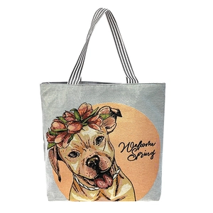 Gray canvas tote bag featuring floral dog embroidery and striped handles with Welcome Spring text