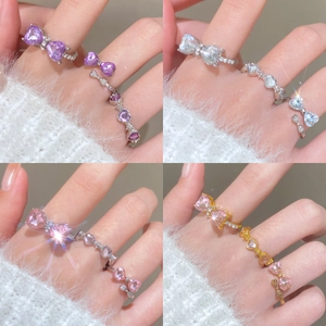 Bowtie ring and heart-shaped colorful zircon band set in gold and silver finish