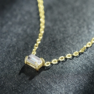 Elegant S925 silver necklace with rectangular emerald-cut zircon on a dark surface