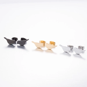 Minimalist stainless steel bird stud earrings in black, gold, and silver finishes