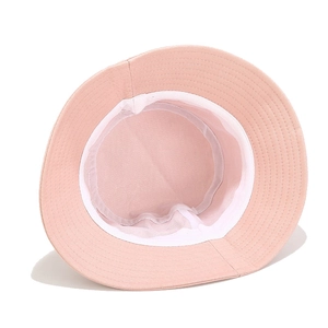 Pink cotton bucket hat with breathable mesh lining and reinforced brim stitching