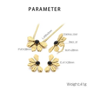 Detail showing 18K gold-plated stainless steel flower jewelry set with black oil accent