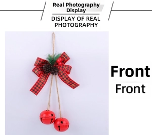 Detail of Christmas bell ornament with red plaid bow, pine cones, and berries