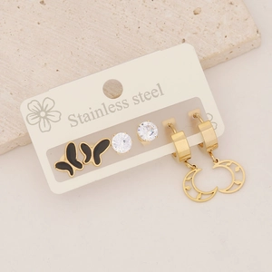 Detailed set of gold stainless steel earrings featuring black butterflies and crescent moons