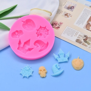 Pink silicone Halloween baking mold with pumpkin, wizard hat and skull shapes for DIY cakes
