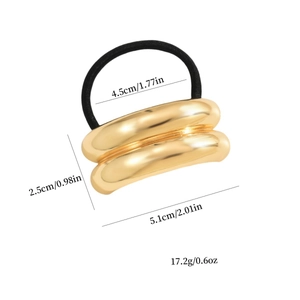 Polished gold metal geometric elastic hair tie with minimalist texture on white background
