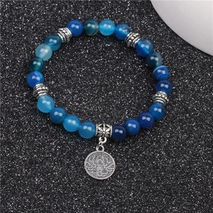 Bracciale di perline in agata occhio di tigre con pietre blu e ciondolo loto argento