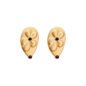 Vintage golden flower earrings featuring two blue gemstones on a clean white background