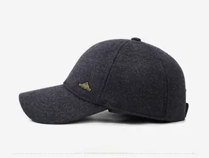 Detail view of charcoal wool blend cap featuring a mountain logo and Sport Spirit badge