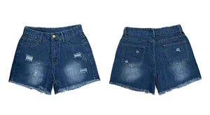 Flat lay of ripped denim shorts showing front and back with fringe and distressed details