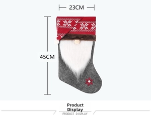Detail view of 45cm Nordic gnome Christmas stocking with snowflake patterns and white beard