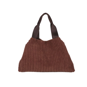 Large dark brown corduroy bucket bag with sturdy handles for casual commuting