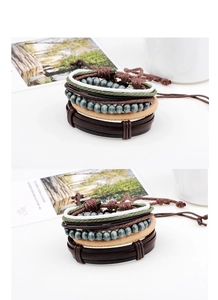 Close-up of handmade multi-layer leather bracelet with wooden beads and woven hemp rope