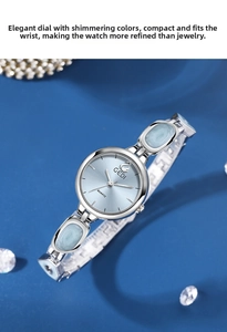 Detailed shot of GEDI silver quartz watch with light blue sunray dial and chain strap