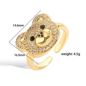Detailed view of a gold bear ring with sparkling crystals, weight 4.5g and size 16.9mm