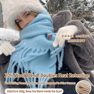 Light blue wool blend tassel scarf 220x31cm warming winter shawl for women in snow scene