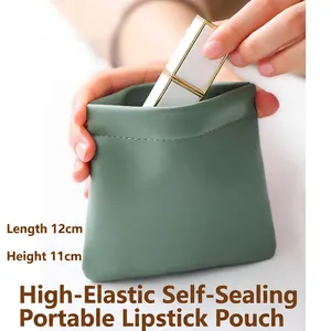 Mini self-closing makeup bag in green faux leather, portable lipstick pouch for women