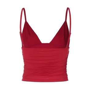 Detailed view of the red ruched V-neck crop top with slim spaghetti straps and pleated fabric