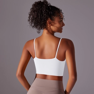 Rear view of white nylon sports bra showing back strap design and high-stretch fabric
