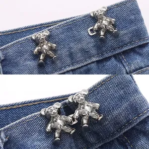 Bear-shaped metal waist buckle for jeans adjustments showing before and after effect
