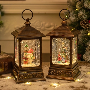 Set of 2 bronze Christmas snow globe lanterns with Santa and tree inside warm lights