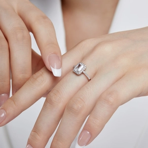 S925 sterling silver ring with emerald-cut zirconia worn on hand for a luxury look