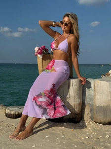 Purple floral bikini set with matching mesh wrap maxi skirt for beach vacation wear